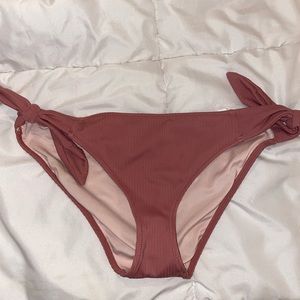 Small pinkish swim bottoms from target